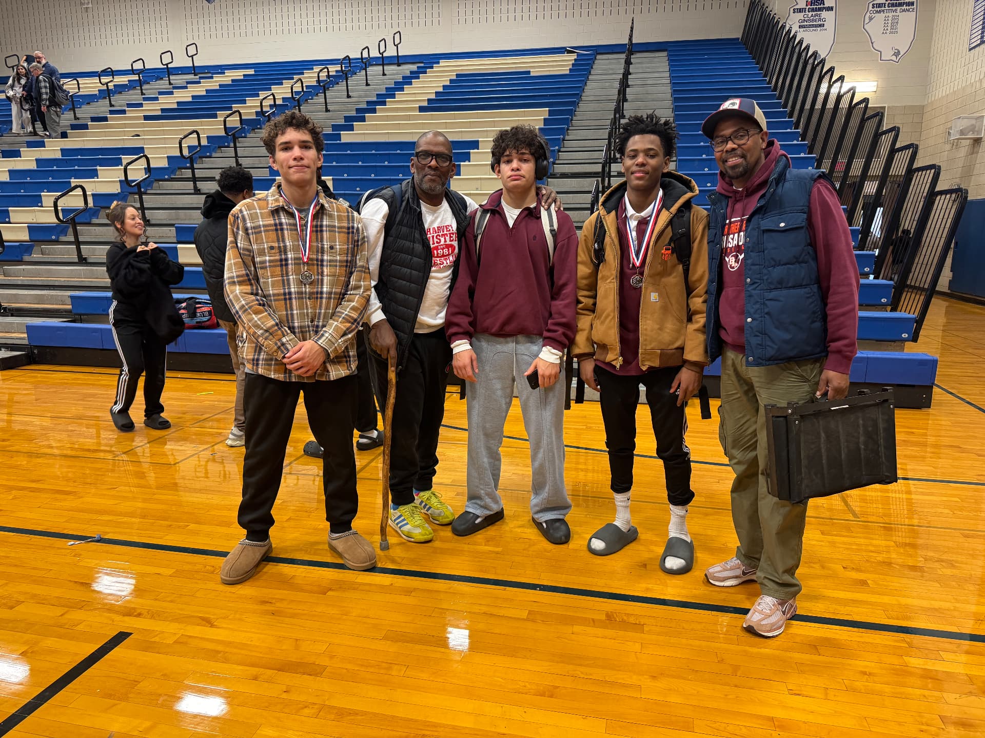 Duane with teammates, coaches and family after the tournament